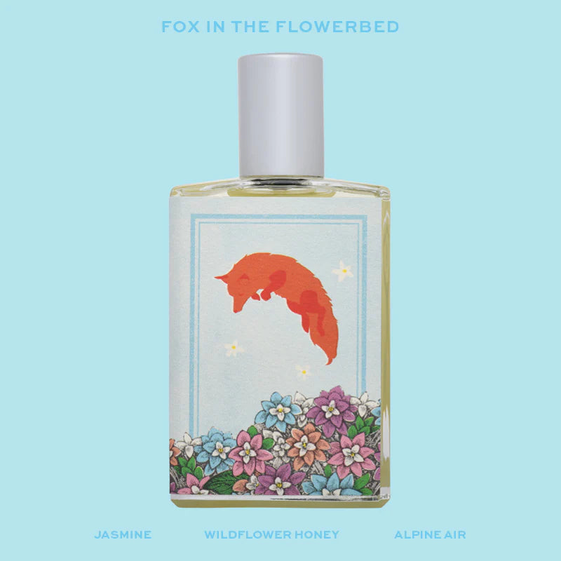 Fox In The Flowerbed